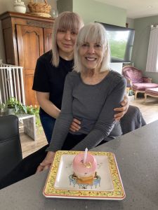 Aneta John brought pastries/presents for Nancy's birthday last May. Beth Herman