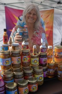 Me working an art festival being the fun pushy vendor that I am! Judy Egge